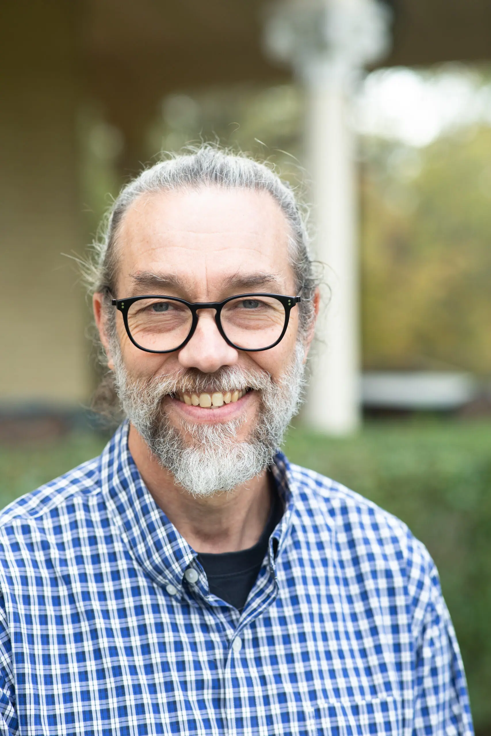 bearded, graying white man with glasses