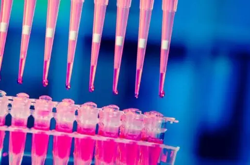 Droppers and Test Tubes, both filled with a pink liquid on a soft blue background