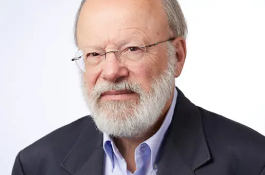 older white man with glasses and beard