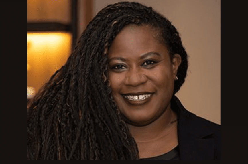 smiling black woman with long braids