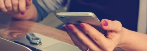 girl holding cellphone