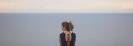 woman alone with horizon line