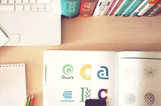 computer with open books
