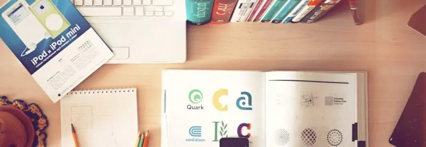 computer with open books