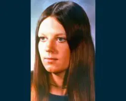 photo of a young white woman with long brown hair