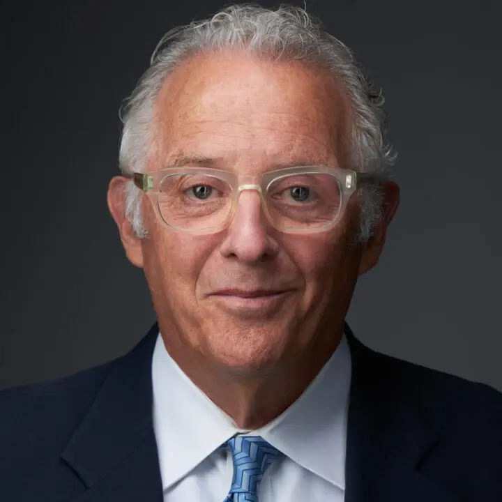 older white man with glasses