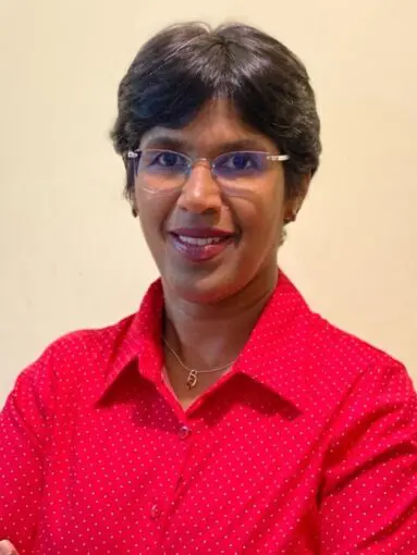 young woman with glasses and red shirt