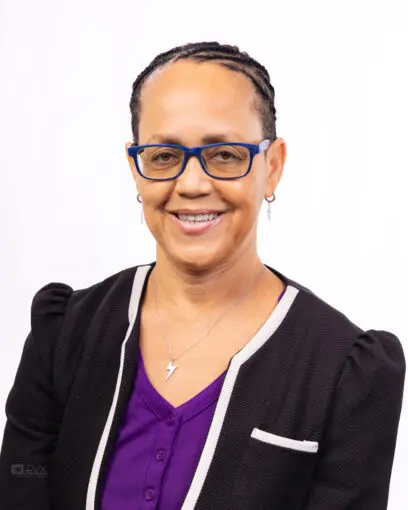 young woman with glasses and brown braids