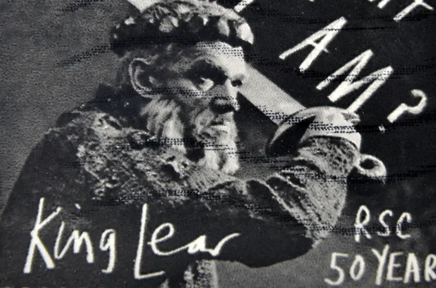 stamp of king lear holding sword from long ago
