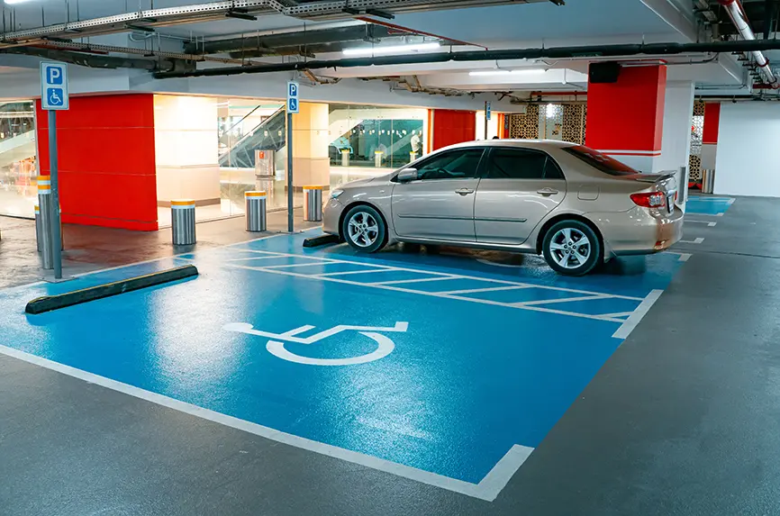 gray car parked in a handicap spot