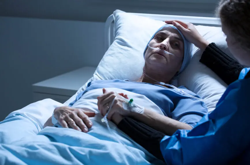 young sick person in hospital bed