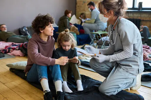 homeless white people talking to a nurse