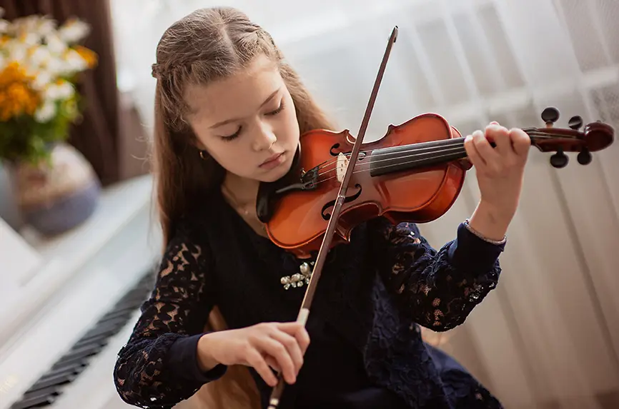 young white girl playing violin