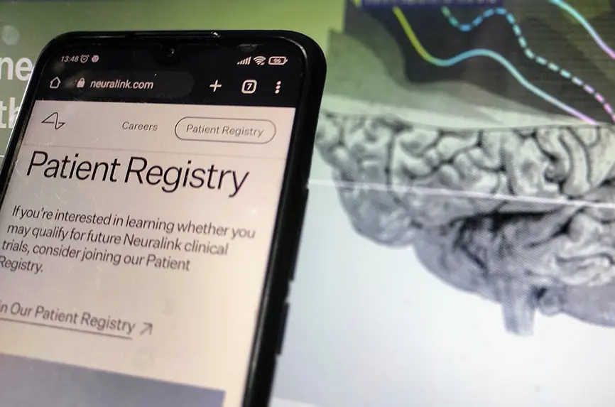 MAJENANG, INDONESIA - JUNE 11, 2023: Neuralink logo on screen. Neuralink, founded by Elon Musk in 2016, develops implantable brain-computer interfaces.