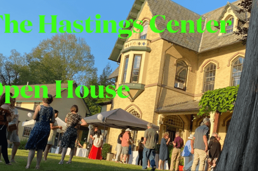 image of The Hastings Center house with people mingling on back lawn for a open house event.