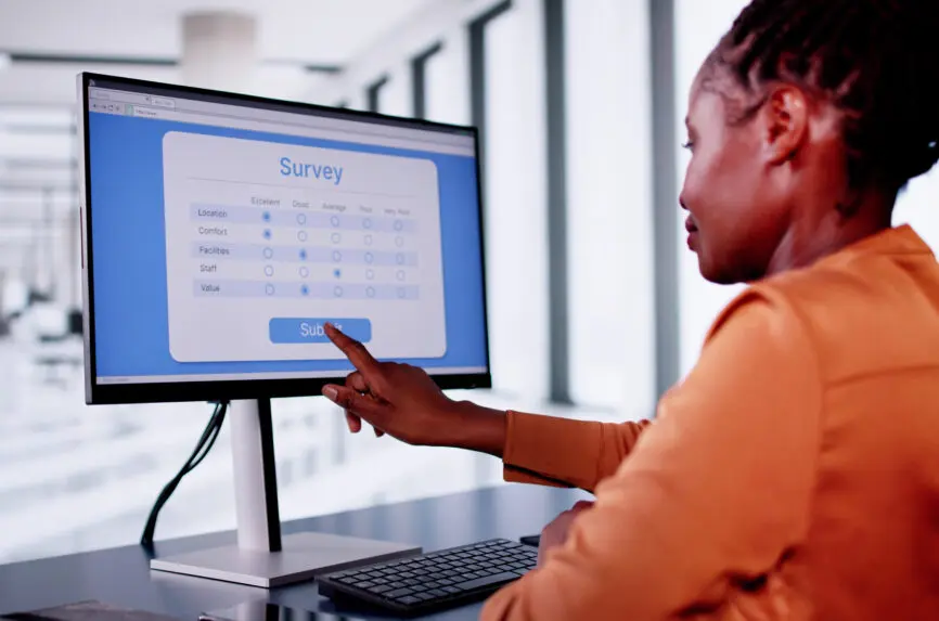 black woman choosing on a screen