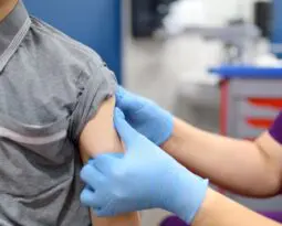 arm held out for vaccination