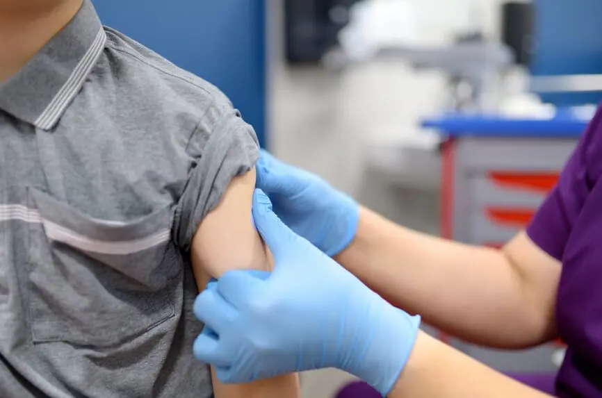 arm held out for vaccination