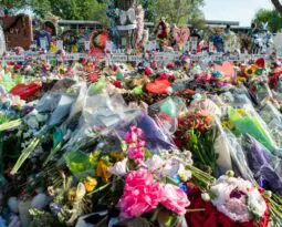flower bouquets outside a mass shooting