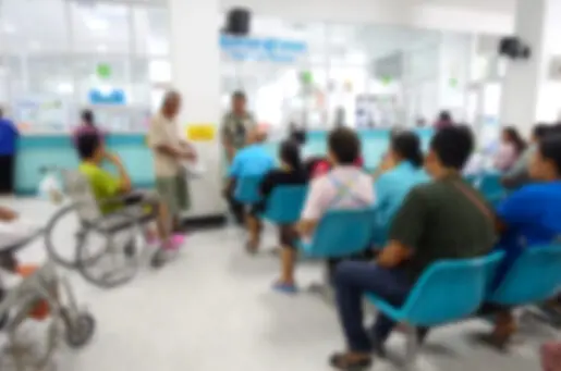 blurry photo of people in a waiting room