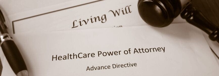 Healthcare Power of Attorney, Living Will documents with legal gavel