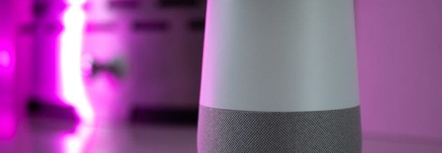 smart home speaker assistant on fireplace with led coloured ambient lighting - Pink