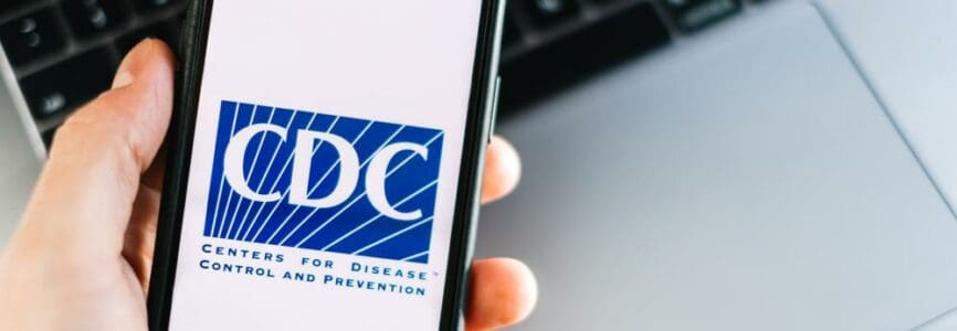 CDC Centers for Disease Control and Prevention logo on smartphone screen. High quality photo