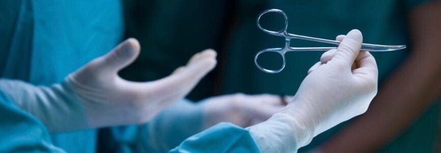 surgeon holding scissors