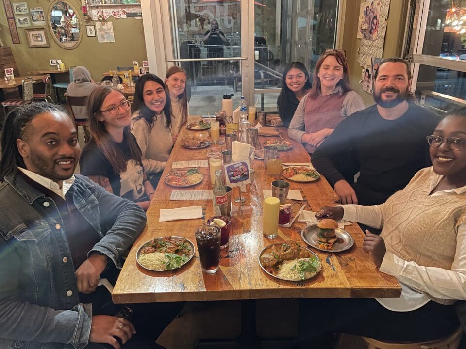 Sadler scholars with hastings center scholars at restaurant