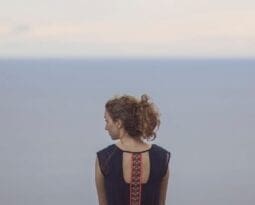 woman alone with horizon line