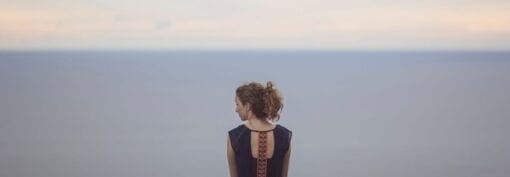 woman alone with horizon line