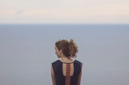 woman alone with horizon line