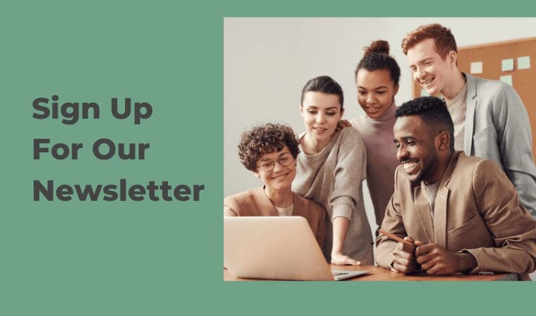 group of people looking at computer. words say sign up for our newsletter