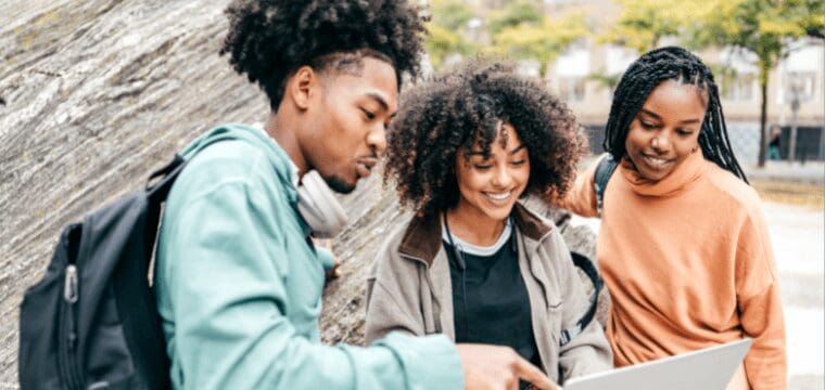 young male and two female diverse students