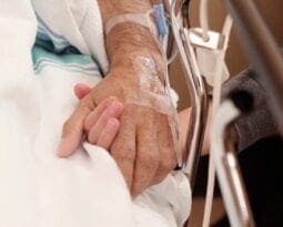 holding hands in hospital