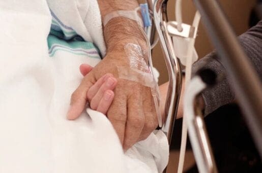 holding hands in hospital