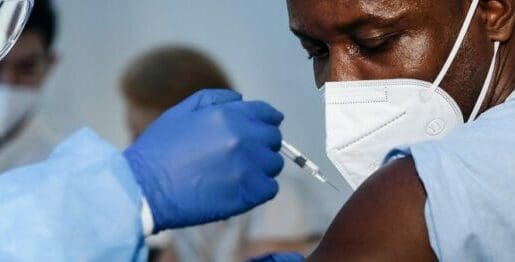 African American male receiving vaccine