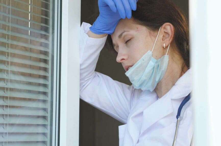 female physician looking stressed