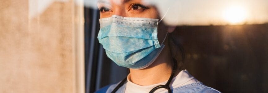 female Covid nurse with mask