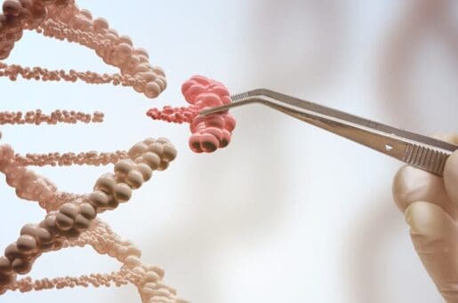 human hand removing gene piece from dna strand