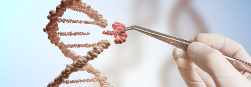 human hand removing gene piece from dna strand