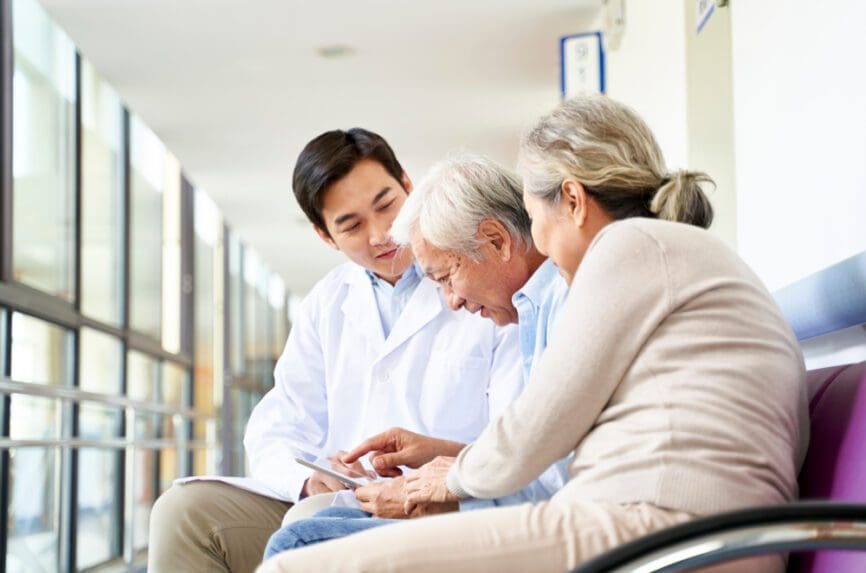 Asian patient and family in hospital